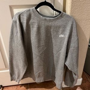 Comfy oversized grey Nike sweatshirt .